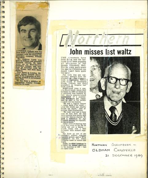 A scan of a page in a book which has two newspaper clippings taped to it. One is about Andrew Lamb, from Oldham, making career advances with Friends Provident. The other has the headline ‘John misses last waltz’, describing the Christmas tea dance at the Queen Elizabeth Hall which happened without John, as he passed away in hospital the week before. This clipping is accompanied with a large black and white photo of John, and below it ‘Northern Scrapbook - OLDHAM CHRONICLE 21 December 1989’ is written in pen.